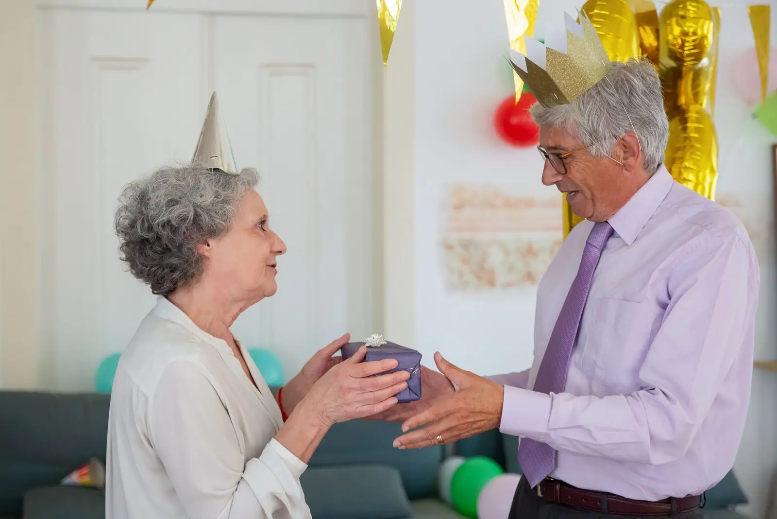 Two residents exchanging a birthday gift